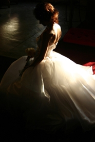 dramatic portrait of bride in her wedding gown