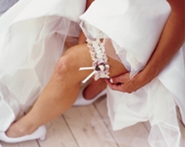 bride displaying garter