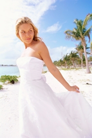young bride on her honeymoon at the beach