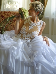 bride posing in wedding gown