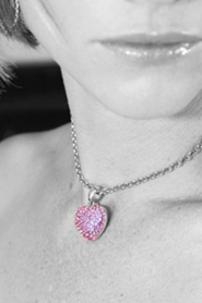 bride wearing heart pendant necklace